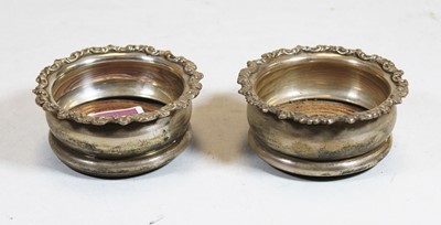Lot 310 - A pair of George V coasters, each of squat...