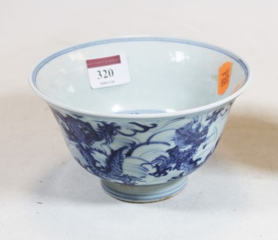 Lot 320 - A Chinese export 'Dragon' bowl, underglaze...