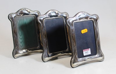 Lot 343 - A matched set of three modern silver clad...
