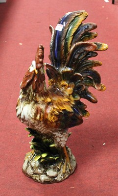 Lot 146 - A large decorative painted ceramic model of a...