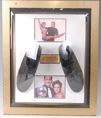 Lot 538 - A pair of black leather shoes bearing various...