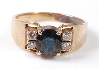 Lot 2566 - A yellow metal, sapphire and diamond dress...