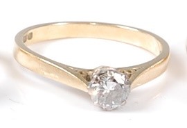 Lot 2531 - An 18ct yellow and white gold diamond single...