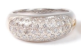 Lot 2528 - An 18ct white gold five-row diamond half hoop...