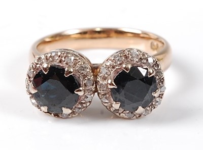 Lot 2532 - A 9ct yellow and white gold, sapphire and...