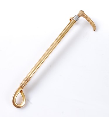 Lot 2539 - A yellow metal bar brooch in the form of a...
