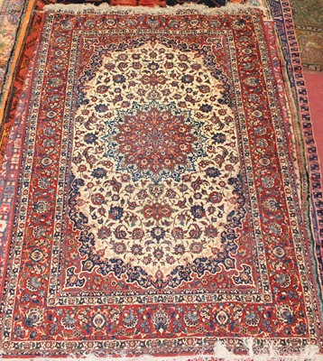 Lot 6 - * A Persian woollen Tabriz rug, the cream...