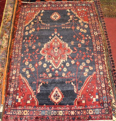 Lot 7 - * A Persian woollen rug, having a deep pile,...