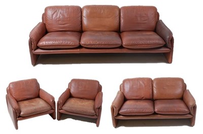 Lot 371 - De Sede - a 1960s tan leather four-piece suite,...