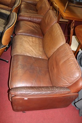 Lot 371 - De Sede - a 1960s tan leather four-piece suite,...