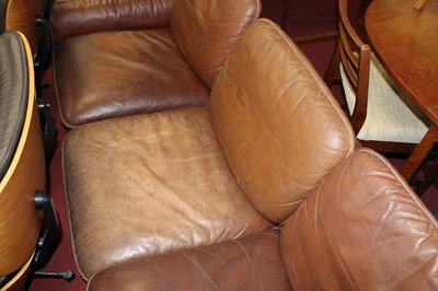 Lot 371 - De Sede - a 1960s tan leather four-piece suite,...