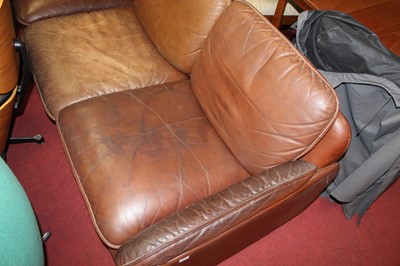 Lot 371 - De Sede - a 1960s tan leather four-piece suite,...
