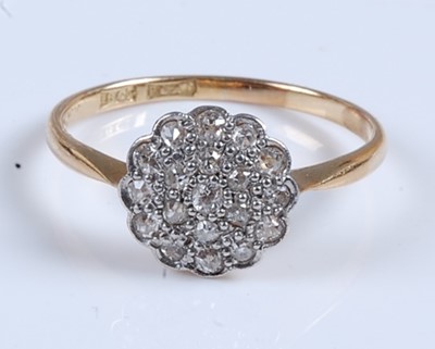 Lot 2557 - A yellow and white metal diamond circular...