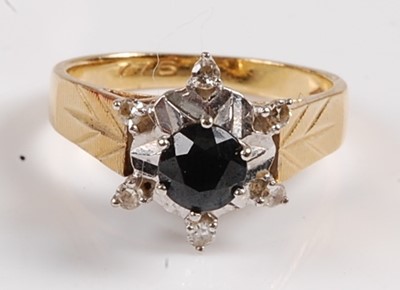 Lot 2550 - An 18ct yellow and white gold, sapphire and...