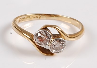 Lot 2559 - A yellow and white metal diamond two-stone...