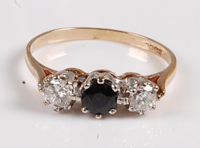 Lot 2551 - A 9ct yellow and white gold, sapphire and...