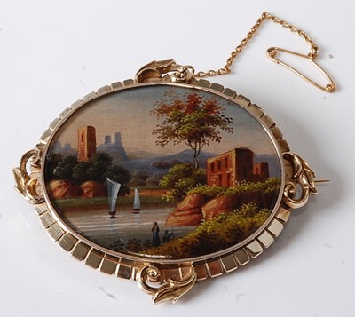 Lot 2554 - A yellow metal mourning brooch depicting a...