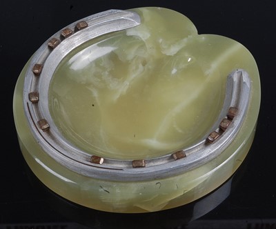 Lot 2510 - An onyx shallow table bowl, surmounted by a...