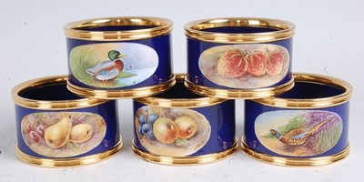 Lot 337 - A set of five porcelain napkin rings, each...