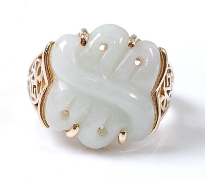 Lot 2563 - A 14ct yellow gold jadeite dress ring,...
