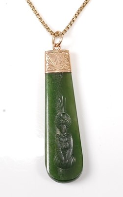 Lot 2564 - A yellow metal nephrite lozenge shaped pendant,...
