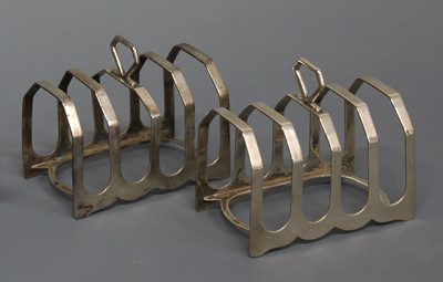 Lot 122 - A pair of Art Deco silver four division toast...