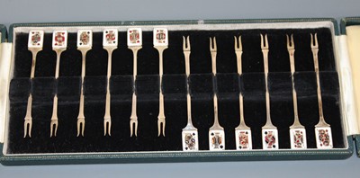Lot 100 - A set of twelve 1960s silver and enamel...