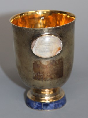 Lot 129 - A contemporary silver gilt pedestal beaker by...