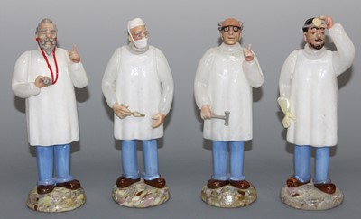 Lot 79 - A set of four Italian Murano glass figures of...