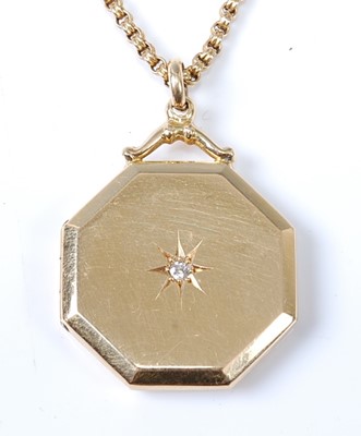 Lot 2570 - A yellow metal octagonal locket with a centre...