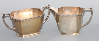 Lot 137 - A late Art Deco silver twin handled sugar bowl...