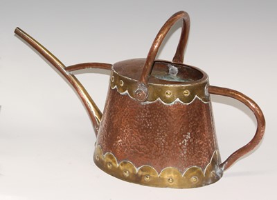 Lot 170 - An Arts & Crafts planished copper and brass...