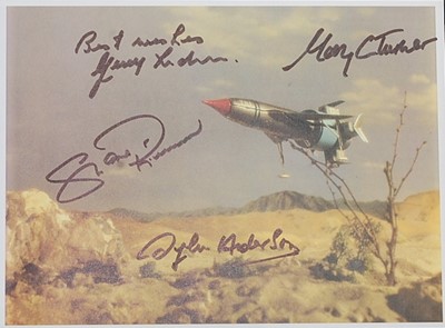 Lot 547 - Thunderbirds, a coloured print showing...
