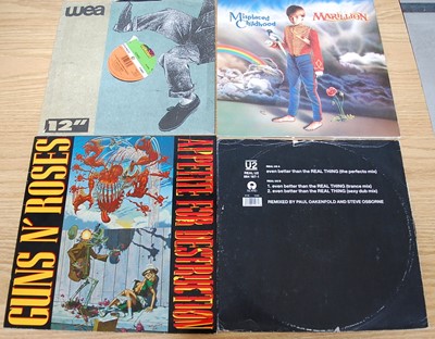 Lot 667 - A collection of assorted 12" vinyl singles and...