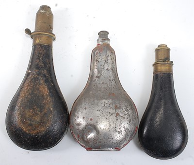 Lot 2348 - A late 19th century black painted metal powder...