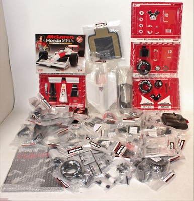 Lot 1064 - A large quantity of sealed Kyosho 1/8 scale...