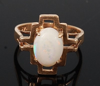 Lot 2625 - A yellow metal opal dress ring, featuring an...