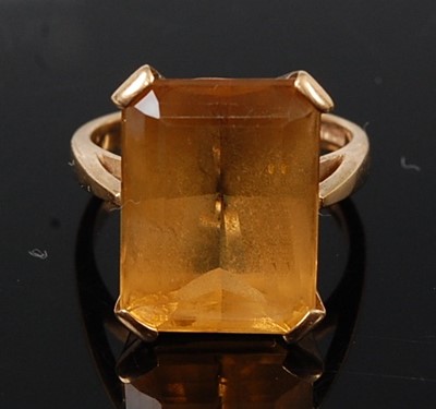 Lot 2578 - A yellow gold citrine single stone ring,...
