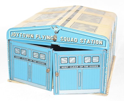 Lot 865 - A Mettoy Joytown Flying Squad tinplate police...