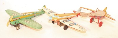 Lot 876 - Three various tinplate and clockwork model...