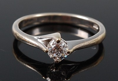 Lot 2594 - A 9ct white gold diamond single stone ring,...