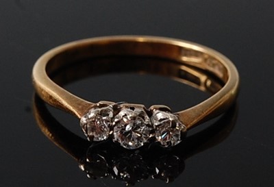 Lot 2602 - A yellow and white metal diamond three stone...