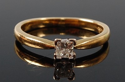 Lot 2609 - An 18ct yellow and white gold diamond single...