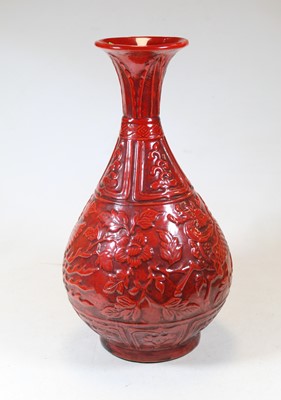 Lot 16 - A modern Chinese red glazed porcelain vase,...