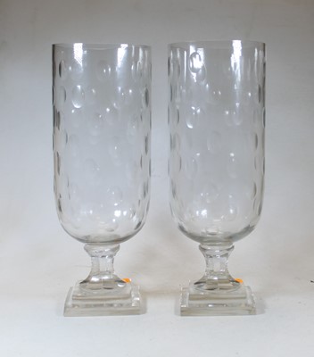 Lot 17 - A pair of modern cut clear glass storm lamps,...