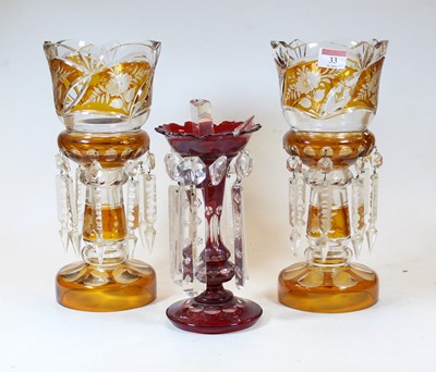 Lot 33 - A pair of Bohemian style amber overlaid etched...