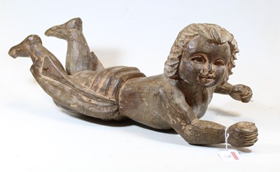 Lot 36 - A chip-carved pine figure of a child in...