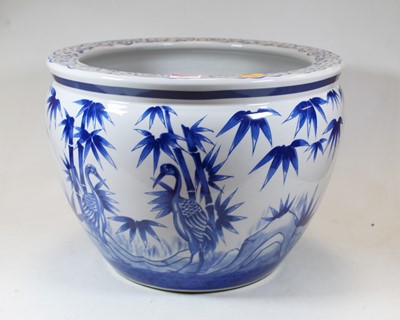 Lot 86 - A large reproduction blue and white jardinière,...