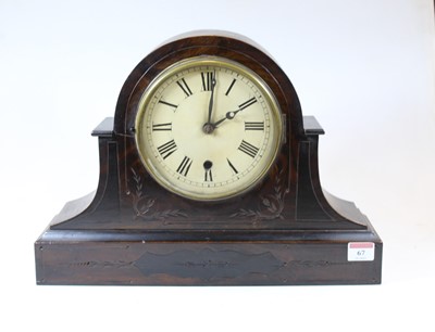 Lot 67 - A late Victorian simulated walnut mantel clock,...