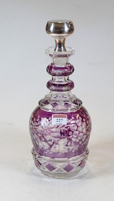 Lot 227 - An amethyst overlaid and etched glass triple...